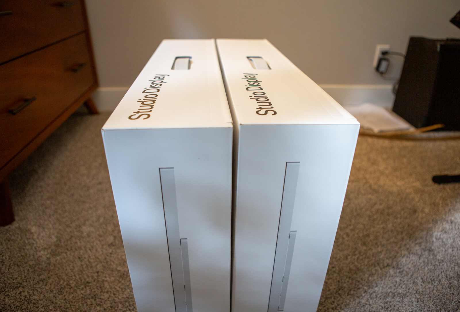 Two Apple Studio Display boxes.