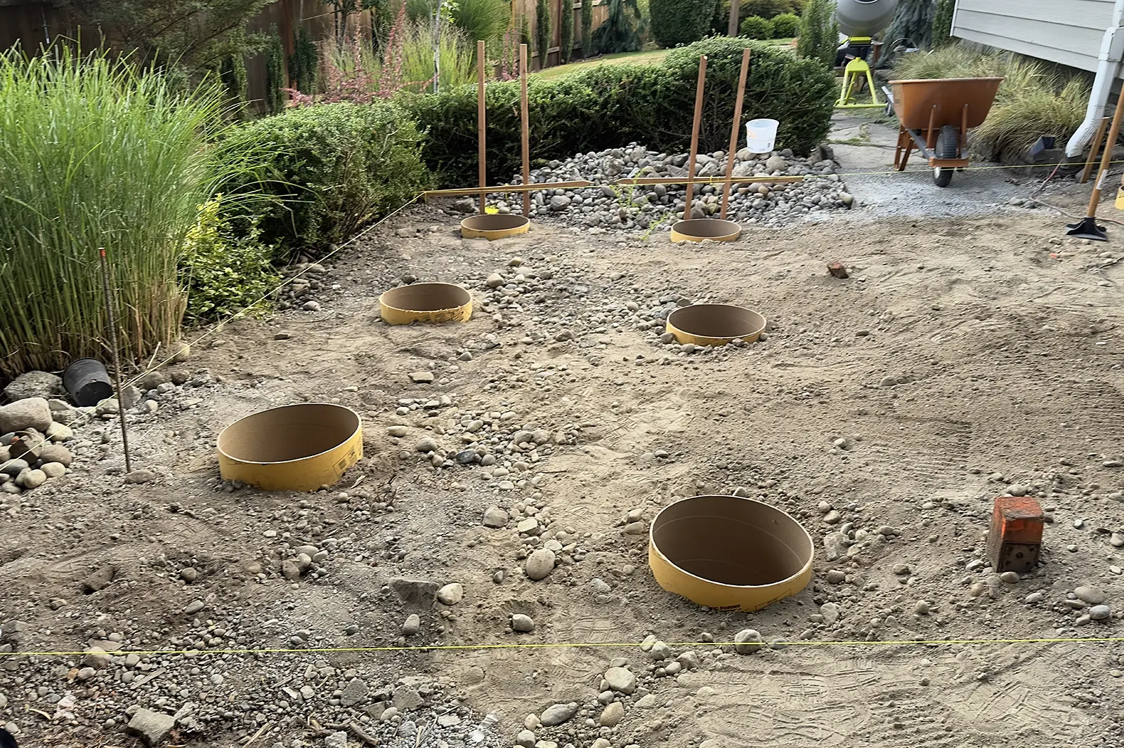 The old deck was built on top of footings resting right on grade. Time to fix that.